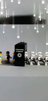 LEGO figures line up creatively against a gray backdrop with stars.