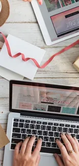 Creative desktop with gadgets and stationery for workspace inspiration.