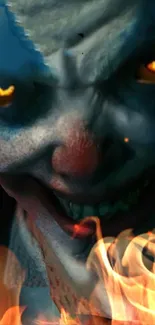 Creepy clown face surrounded by flames with glowing eyes.