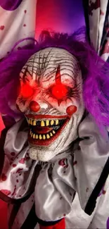 Creepy clown with red eyes and purple hair on a vibrant background.