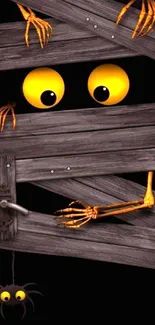 Spooky Halloween wallpaper with yellow eyes peeking through wooden planks.