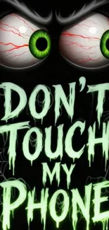 Creepy phone wallpaper with glowing text and green eyes.