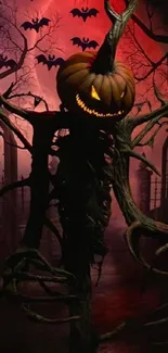 Eerie Halloween wallpaper with pumpkin head scarecrow in haunted forest scene.