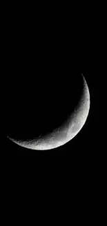 Crescent moon in a dark night sky wallpaper.