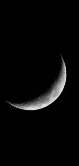 Crescent moon against a black night sky, perfect mobile wallpaper.