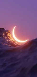 Glowing crescent moon over ocean waves with purple sky.