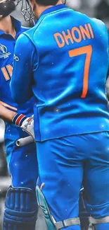 Cricket players in blue uniforms on the field.