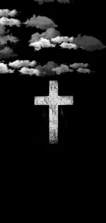 Minimalist black wallpaper with cross and clouds.