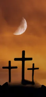 Silhouette of three crosses under a moonlit ochre sky.