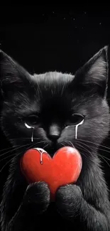 Black cat holding a red heart, crying on a dark background.