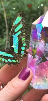 Hand holding crystal with a butterfly in a mystical garden scene.