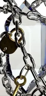 Crystal wrapped in metal chains with a lock and key design.