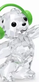 Crystal bear with green headphones on a white background.