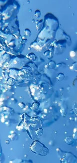 Crystal blue water droplets creating an abstract and vibrant splash effect.