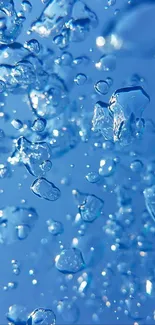 HD wallpaper of blue water droplets cascading beautifully.