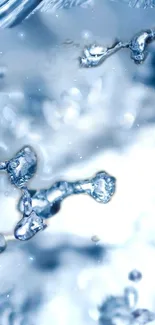 Close-up of crystal clear water drops on a light blue background.