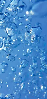 Beautiful mobile wallpaper with clear water drops on a blue background.