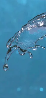 Dynamic water splash on a blue background, capturing motion.