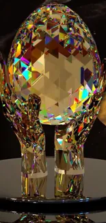 Intricate crystal egg with rainbow shimmer held by hands.