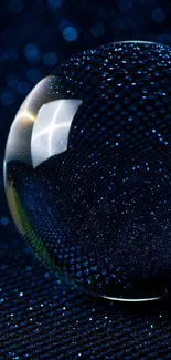 Crystal globe on dark, starry blue background, creating a mesmerizing wallpaper.