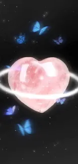 Crystal heart with blue butterflies on black background.