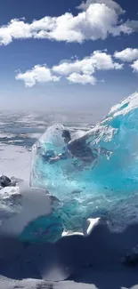 Crystal clear ice under a bright blue sky with fluffy clouds.