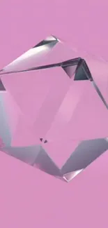 Clear geometric crystal on pastel pink background.