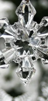 Close-up of a crystal snowflake on a winter-themed mobile wallpaper.