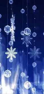 Crystal snowflakes hanging on a deep blue background, perfect for winter decor.