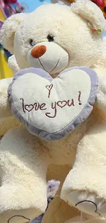 Cuddly teddy bear holding 'I love you' heart.