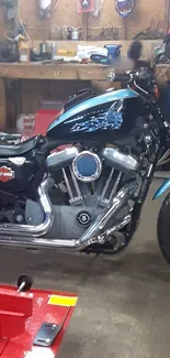 Custom motorcycle parked in a garage, showcasing chrome and sleek design.