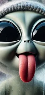 Adorable cartoon alien with large eyes and tongue sticking out.