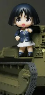 Anime figure on an olive green tank model.