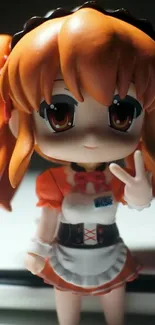 Cute chibi anime figure with orange hair