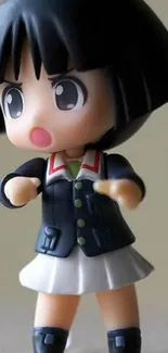 Adorable anime figure with black hair in action pose, wearing a cute outfit.