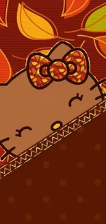 Cute brown cat design with autumn leaves on mobile wallpaper.