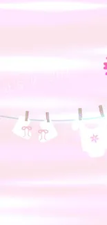 Light pink baby girl theme wallpaper with cute designs.