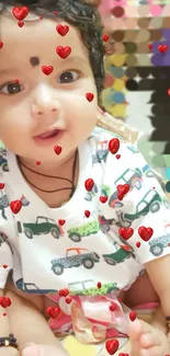 Cute baby with red hearts floating around.