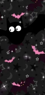 Black and pink bat wallpaper with stars and moons for a cute Halloween vibe.