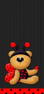 Cute bear in ladybug costume on black background wallpaper.