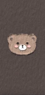 Cute minimalist bear face mobile wallpaper with brown background.