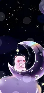 A cute bear sits on a crescent moon with stars around in this whimsical wallpaper.