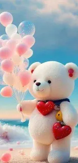 Teddy bear holding pink balloons at the beach with a clear sky.