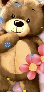 A cute teddy bear holding pink flowers on a soft background.