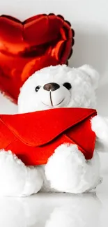 Fluffy bear with red envelope and heart balloon wallpaper.