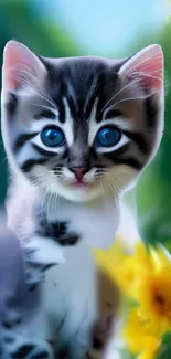 Adorable blue-eyed kitten with nature background, vibrant colors.