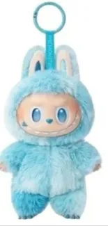 Cute blue plushie with big eyes and soft fur.