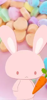 Cute pink bunny holding carrot with colorful candy hearts background.