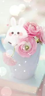 Cute bunny in blue mug with pink flowers wallpaper.