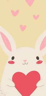 Cute bunny holding a heart on pastel background mobile wallpaper.